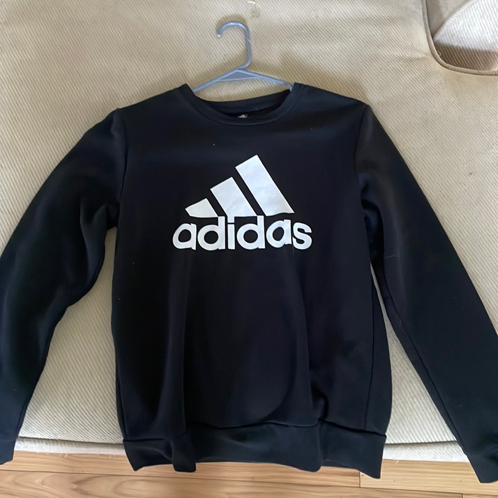 I’m selling a black adidas sweatshirt that has never been worn